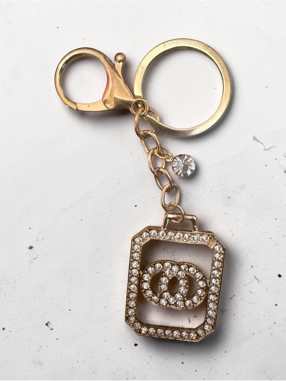 Gold Crystal Keychain Charm with Interlocking Rings Accent